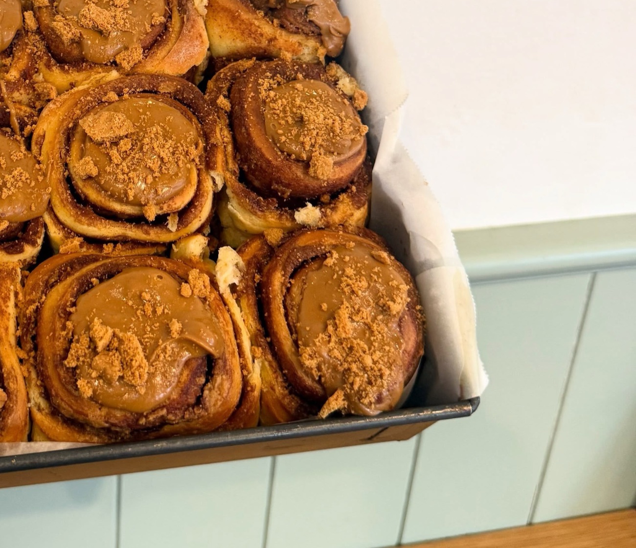 A tray of freshly baked cinnamon-style rolls